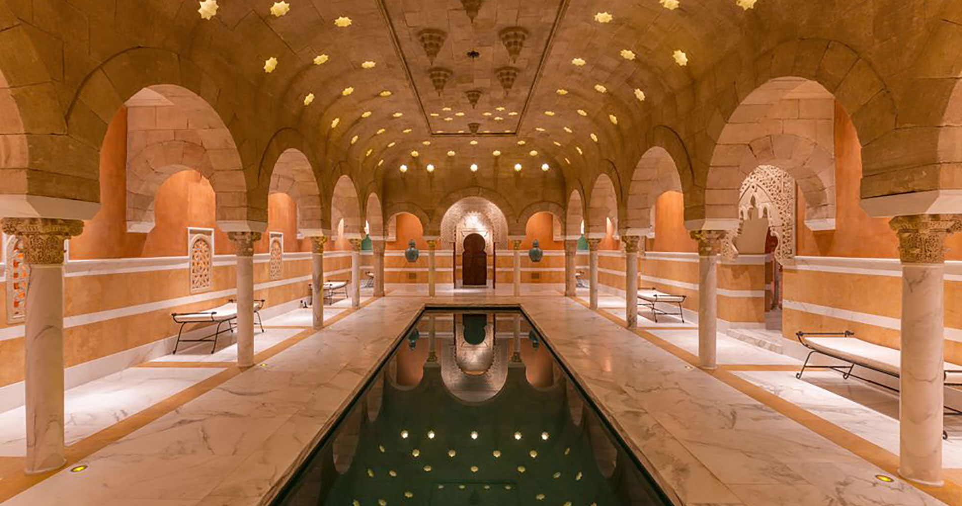Indoor pool hall with stars in the vaulted ceiling