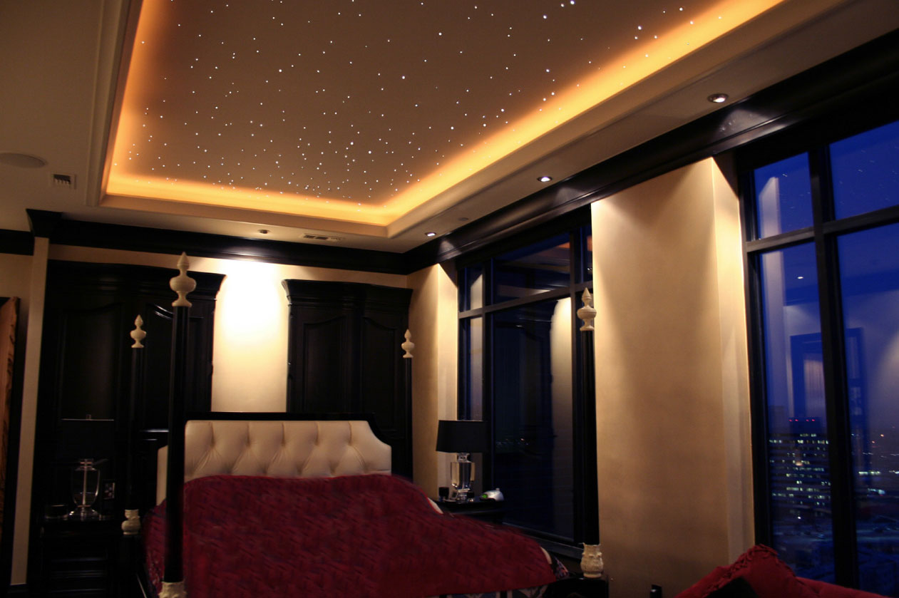 Bedroom with a starry tray ceiling