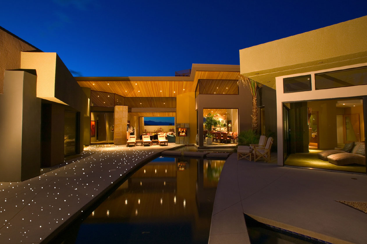 Outdoor pool deck with fiber optic lighting at dusk